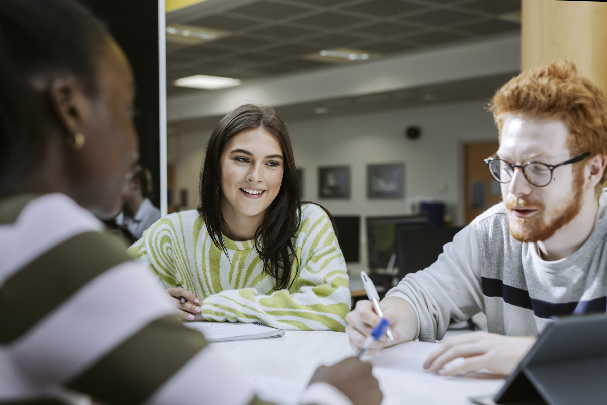Students working together in study space