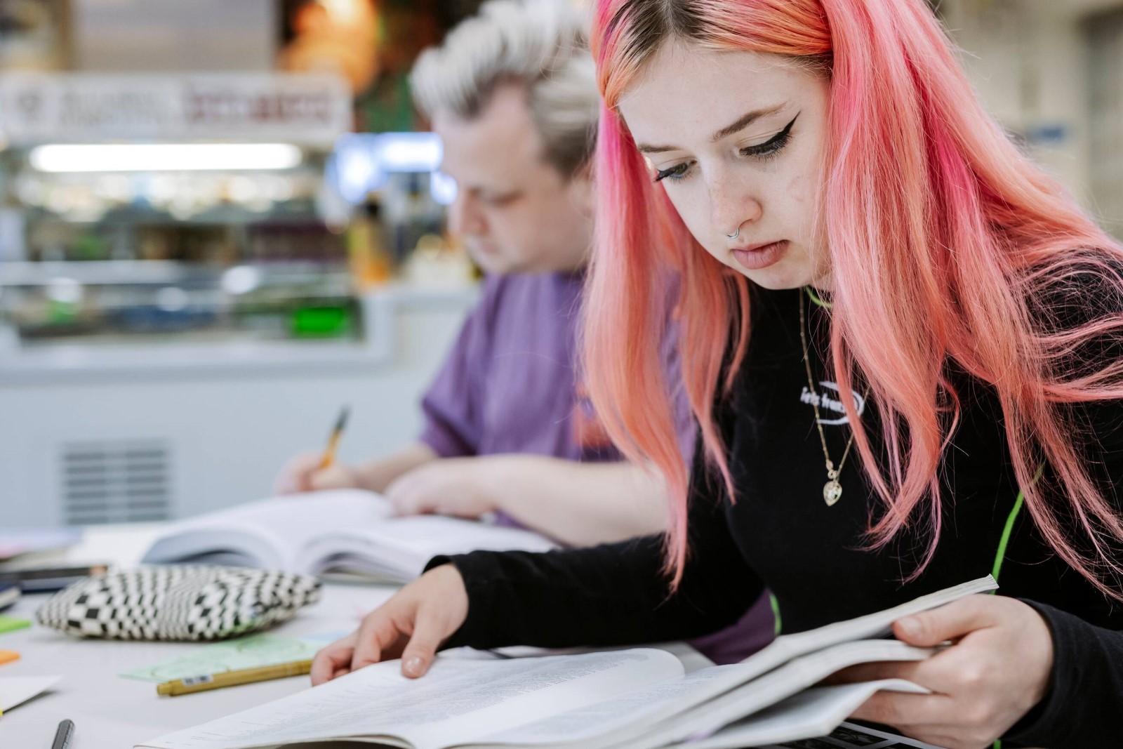 Students working in the Library cafe