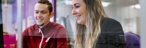Careers member of staff helping student