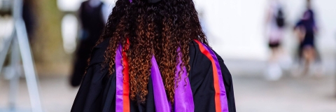 Graduating student walking through to Guildhall Square